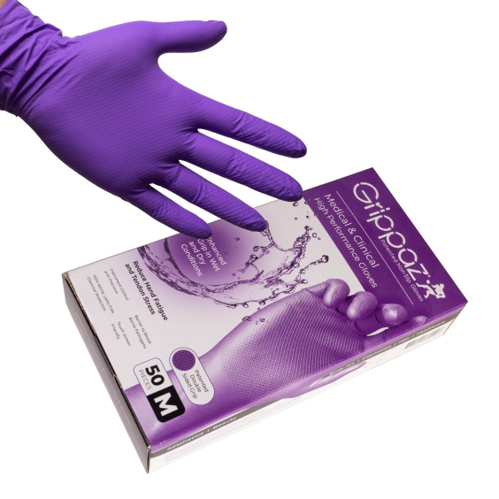 Box of 50 Grippaz violet nitrile gloves with textured grip on hand